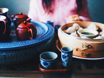 Close-up of tea set on table