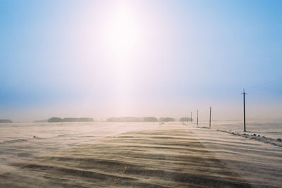 Scenic view of field against clear sky