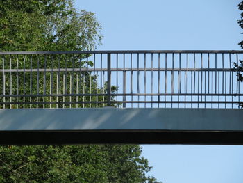 Low angle view of bridge against clear sky
