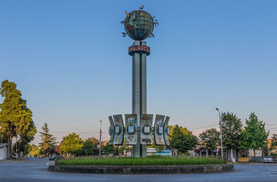 View of communications tower against blue sky