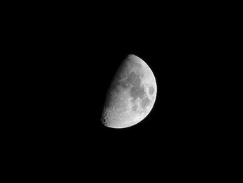 Low angle view of moon against sky at night