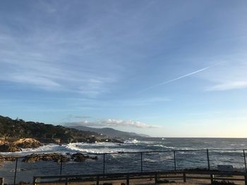 Scenic view of sea against blue sky