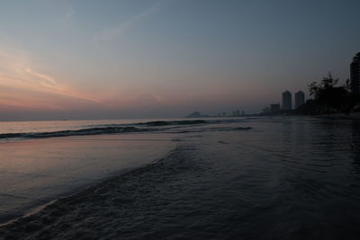 Scenic view of sea against sky during sunset