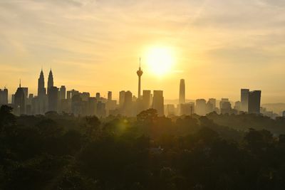 View of buildings against sky during sunset