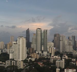 Modern buildings in city against sky