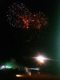 Low angle view of firework display