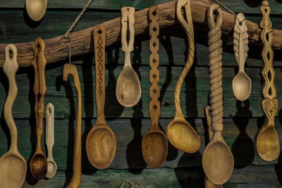 Close-up of clothes hanging on wood