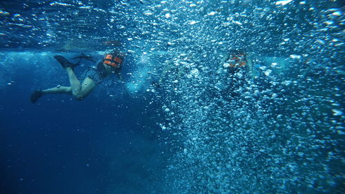 Person swimming in sea