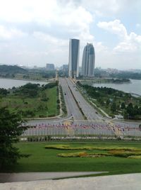 View of city against cloudy sky