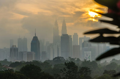 View of modern buildings at sunset