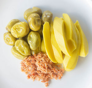 High angle view of yellow bell peppers on table