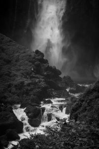 Scenic view of waterfall at night