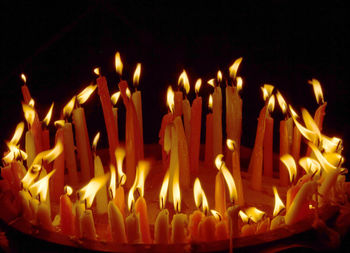 Close-up of burning candles