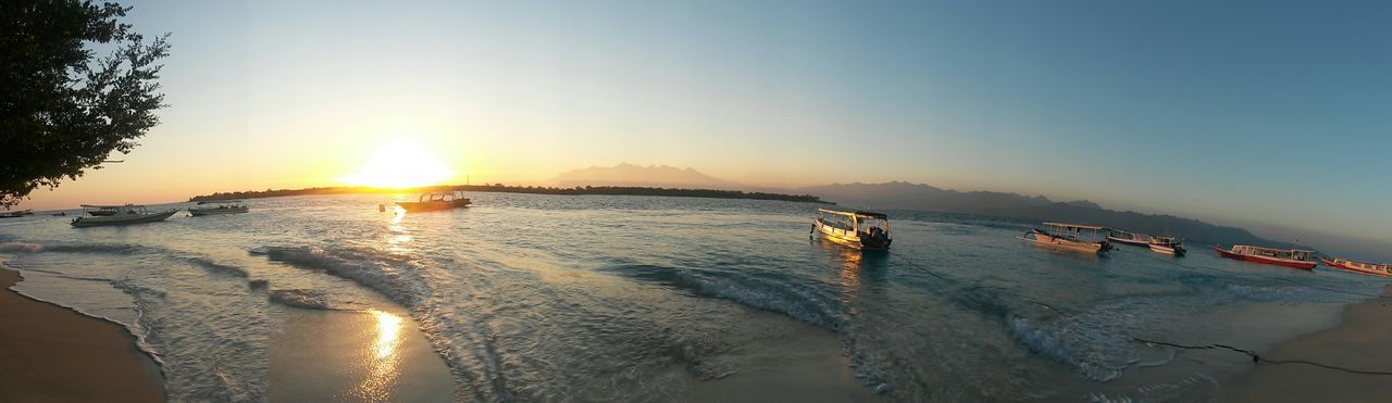 water, sun, sunset, sea, nautical vessel, sunlight, scenics, clear sky, tranquil scene, beauty in nature, tranquility, sunbeam, boat, reflection, transportation, nature, lens flare, sky, idyllic, copy space