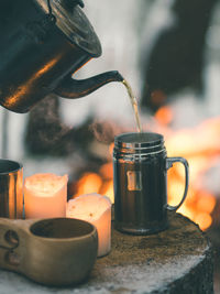 Close-up of coffee cup in jar
