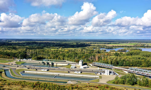 Aerial view of a lock and a railroad bridge over a canal near wolfsburg, germany