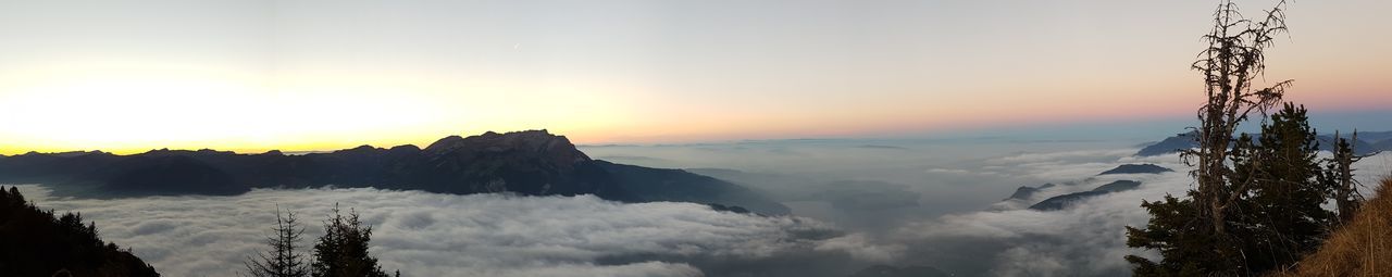 Scenic view of mountains against sky during sunset