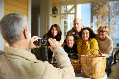 Group of people sitting in restaurant