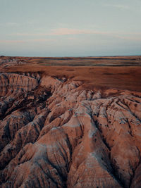 Scenic view of rocky landscape against sky