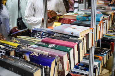 New delhi, india, september 09 2023 - variety of books on shelf inside a book-stall at delhi, india