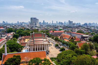 High angle view of buildings in city against sky