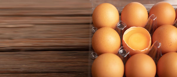 High angle view of eggs in container on table