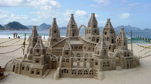 Built structure against cloudy sky