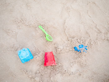 High angle view of toy on sand