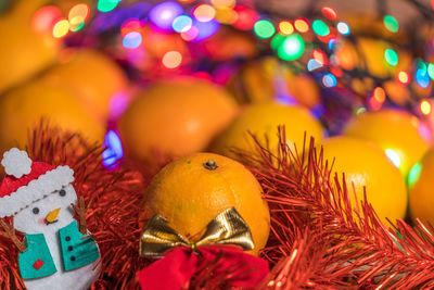 Close-up of multi colored christmas tree at market stall