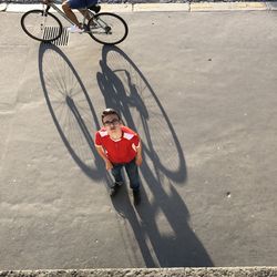High angle view of man riding bicycle
