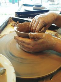 Close-up of person preparing food