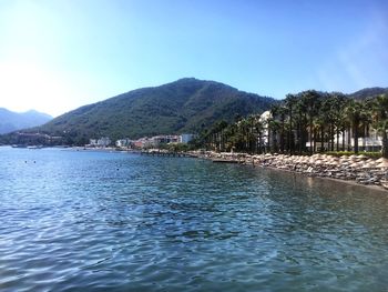 Scenic view of sea against blue sky