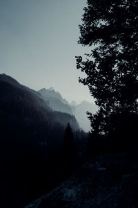 Scenic view of silhouette mountains against clear sky