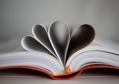 Close-up of heart shape on book