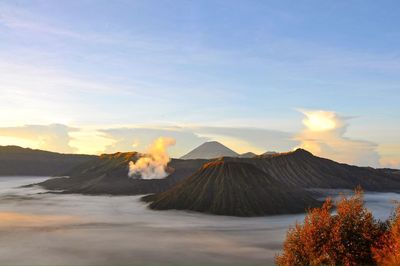 Scenic view of mountains against sky during sunset