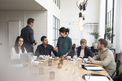 Business people during meeting at table in office