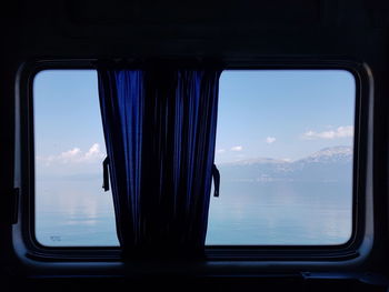 Panoramic view of train seen through window