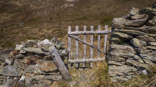 Wooden fence on field