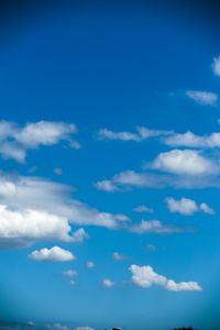 Low angle view of clouds in blue sky