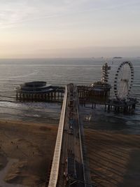 High angle view of amusement park ride at sea