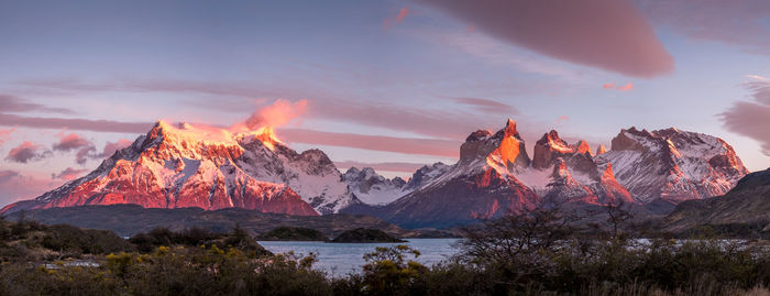Panoramic view of mountains against sky during sunset