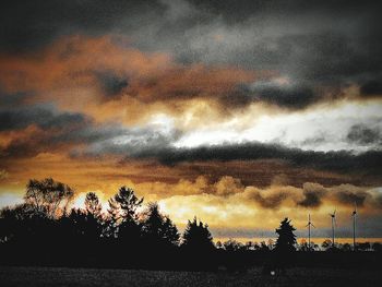 Scenic view of cloudy sky at sunset