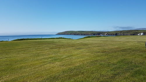 Scenic view of sea against clear sky