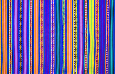 Amazing peruvian traditional textile in purple and cobalt tone vertical strips