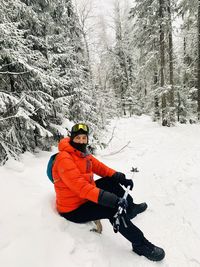 High angle view of person on snow covered field