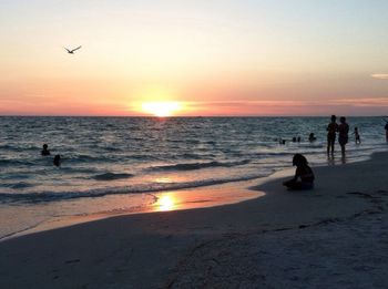 Scenic view of sea at sunset