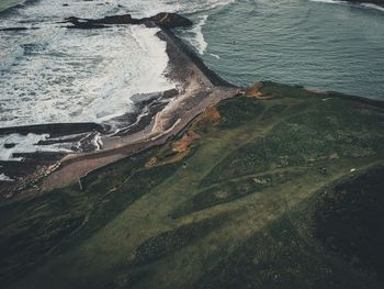 Scenic view of landscape and sea