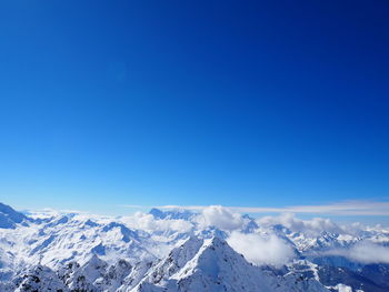 Scenic view of snow covered mountains