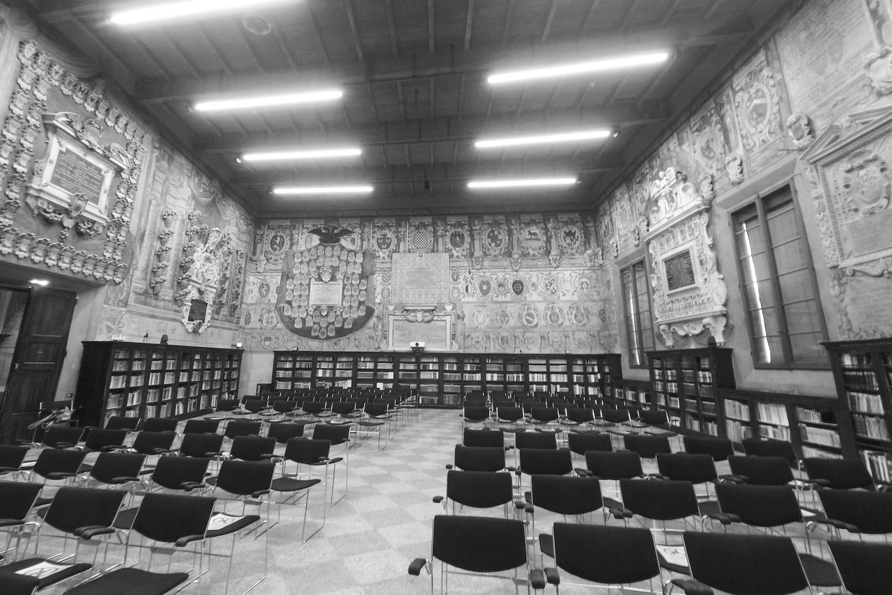 auditorium, seat, indoors, chair, in a row, black and white, architecture, empty, no people, large group of objects, absence, monochrome, ballroom, education, furniture, building, monochrome photography, arrangement, arts culture and entertainment, built structure, school, university