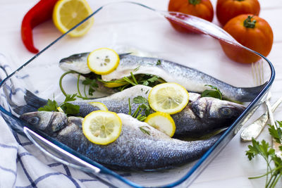 Close-up of fish in plate on table